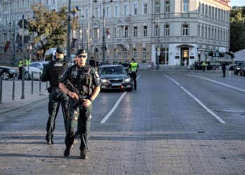 NATO criticized for endangering peace as summit opens